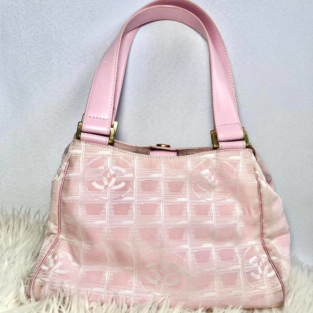 2000s Authentic Baby Pink Chanel Travel Monogram Purse with CC and Chanel Clover